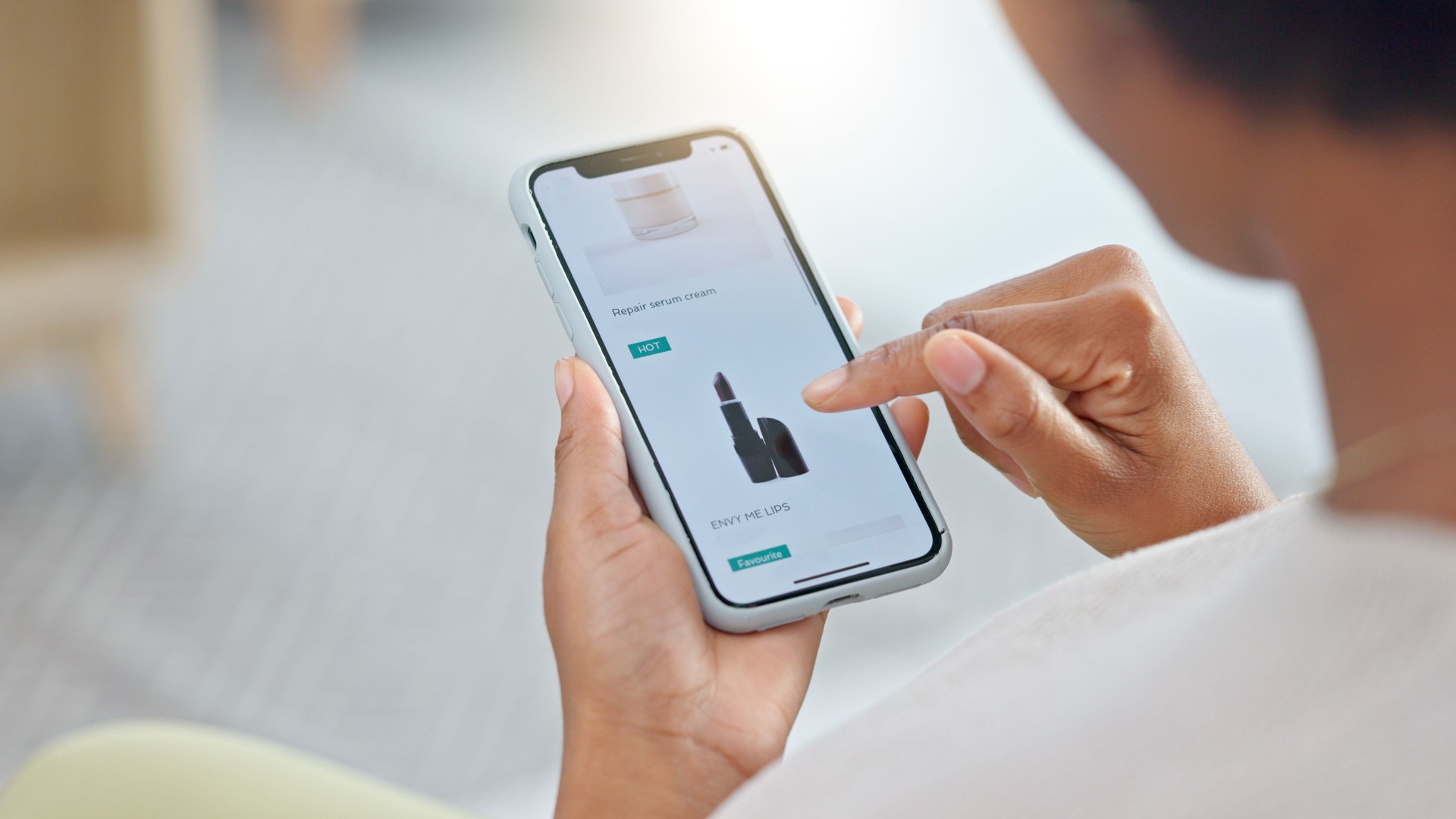 Online shopping, phone and hand scroll on makeup website for sale and deal on skincare. Person, beauty and cosmetics on mobile app for lipstick product on social media store with digital catalog